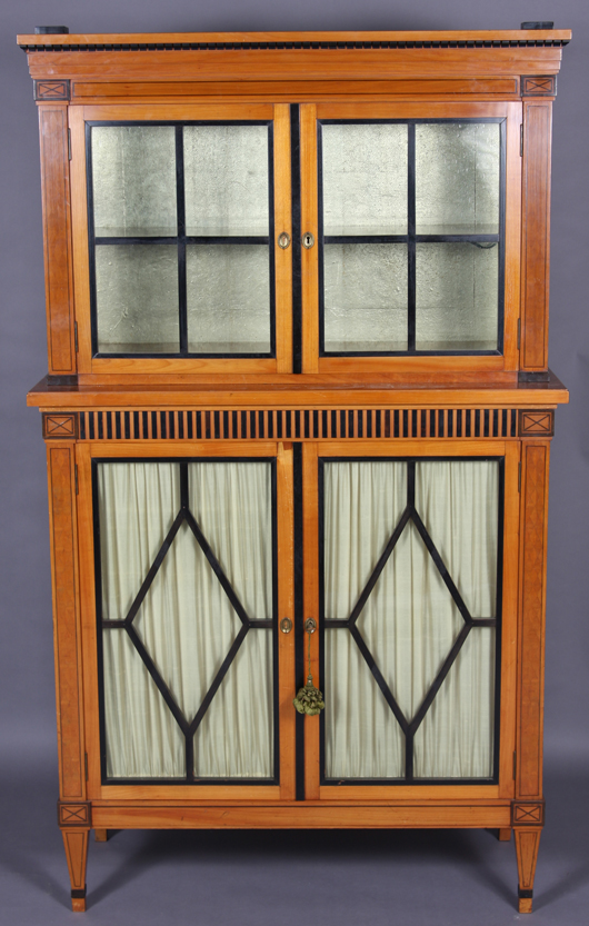 Biedermeier-style birch and ebony finished cabinet, Continental, first quarter 20th century. Estimate $1,500-$2,500. Stefek’s Auctioneers & Appraisers.